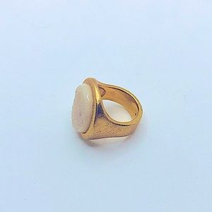 - Marcia Moran cute white ring